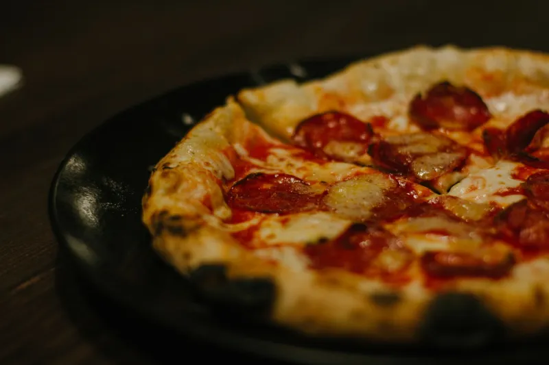 Born in America: The Unlikely Origin Story of Pepperoni and How It Conquered Every Pizza Box in the Country